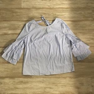 blouse with bell shaped sleeves.